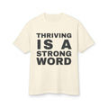 Thriving Is A Strong Word · Heavyweight Tee